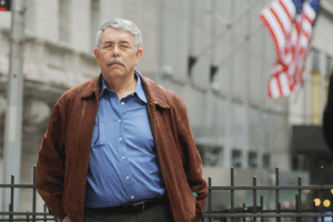 american flag and man