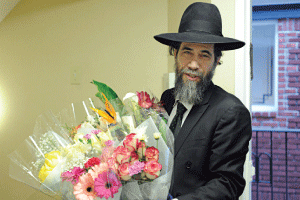 man with bouquet of flowers