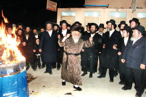 dancing around a fire in meron