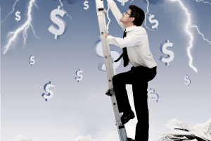 man climbing out of debt concept